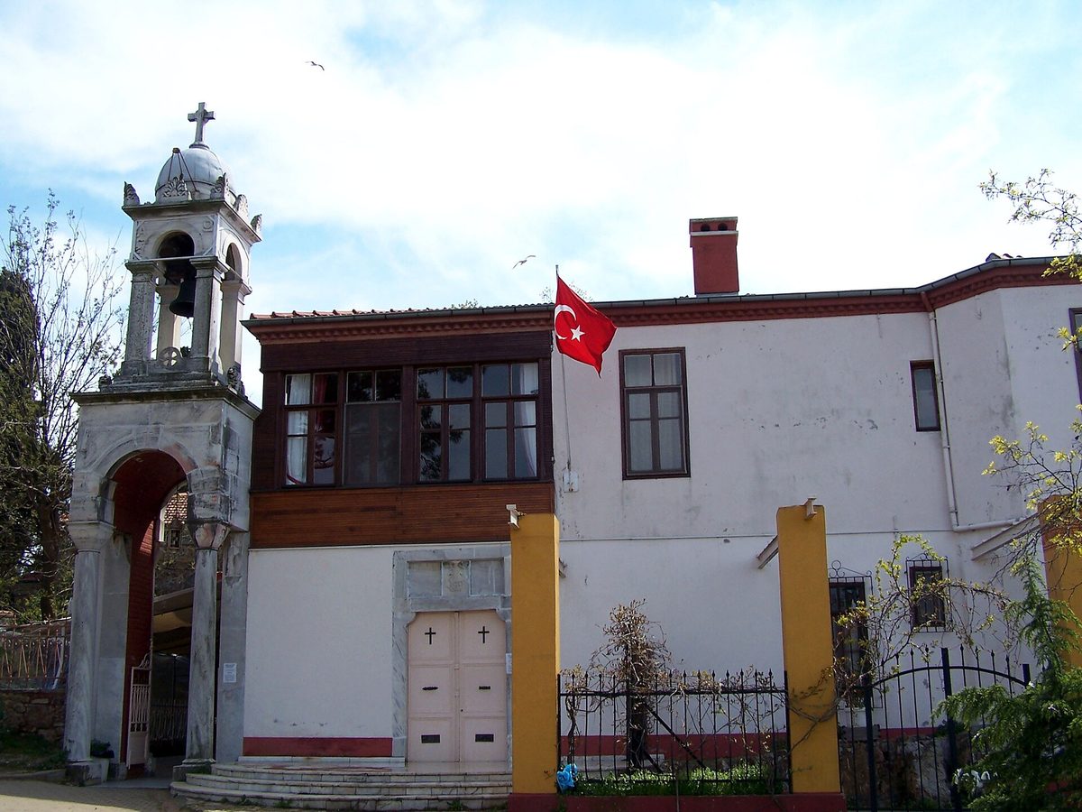 The whitewashed chapel and bell tower of the Aya Yorgi monastery on the hill above Buyukada