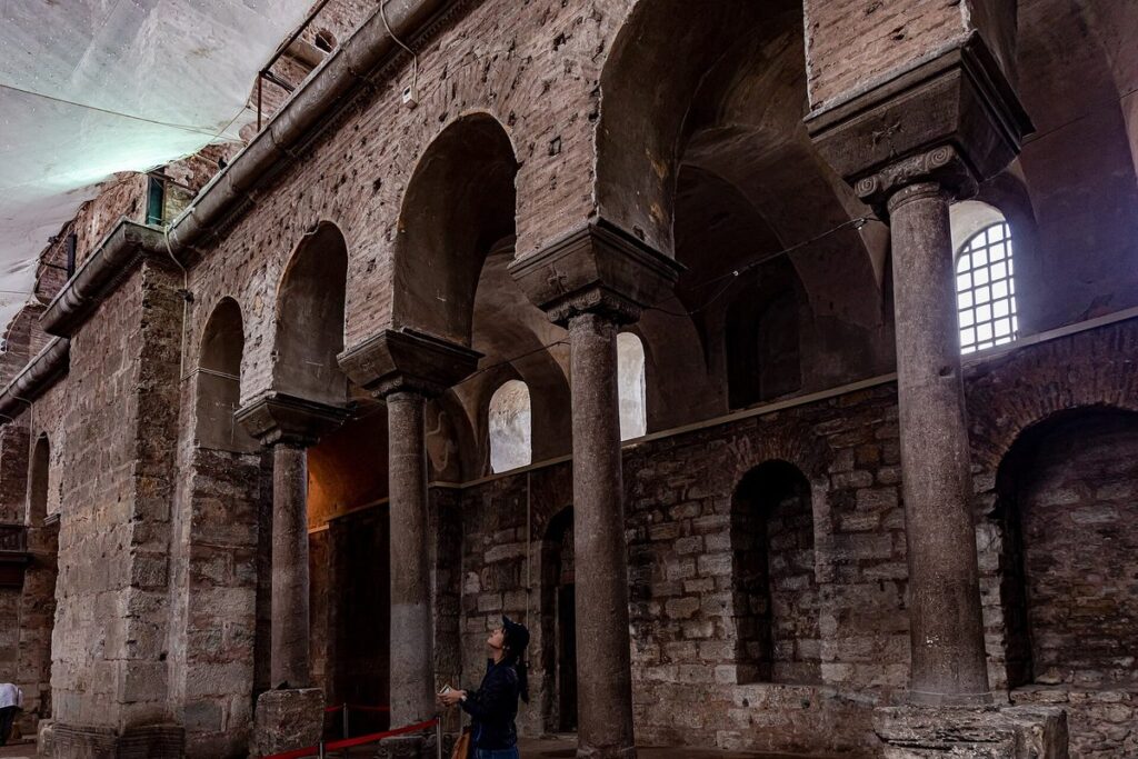The brick and stone interior of Hagia Irene in the first courtyard of Topkapi Palace