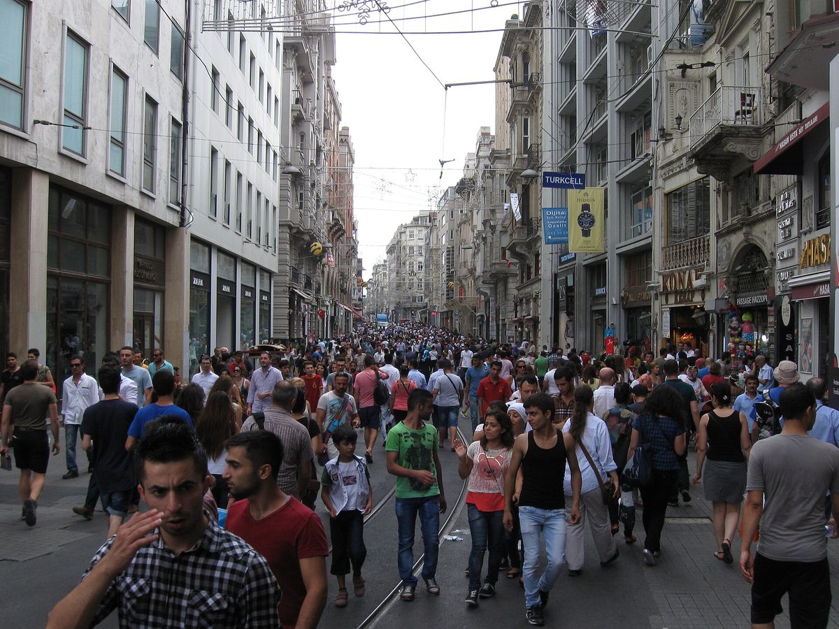 Crowds filling Istiklal Caddesi in Beyoglu with the tram tracks running down the middle