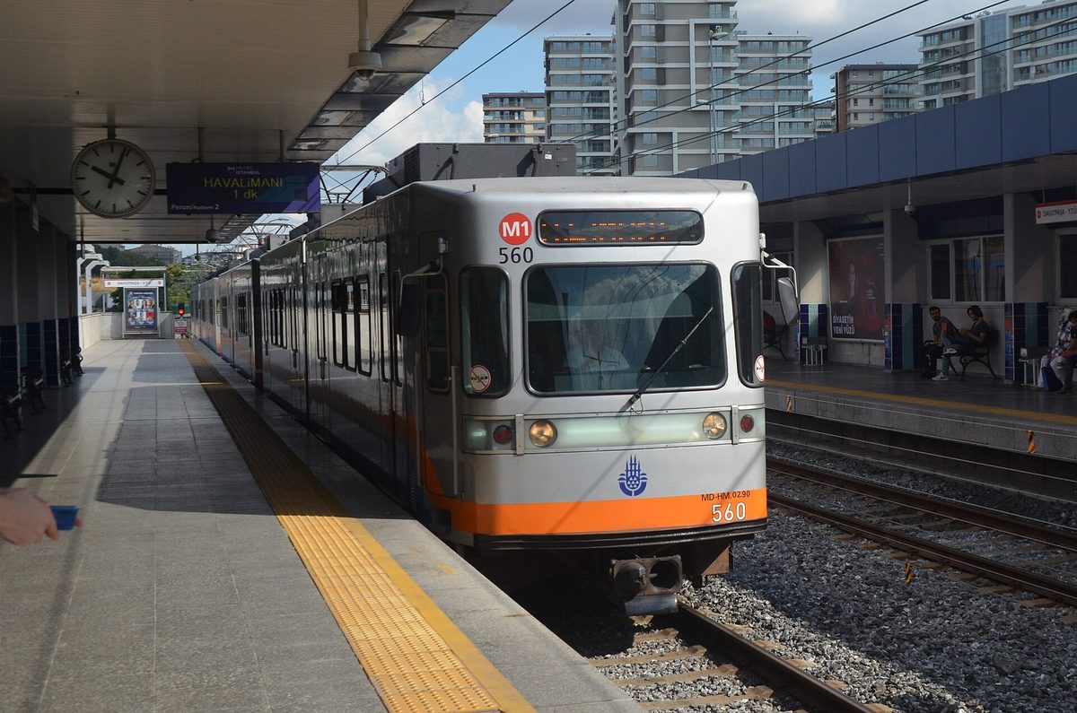 An Istanbul metro train arriving at a station platform, one of the transport modes covered by the Istanbulkart
